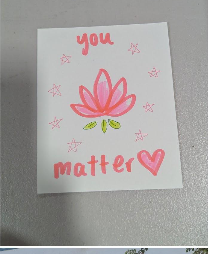 Handmade card reading You Matter with a painted lotus and stars